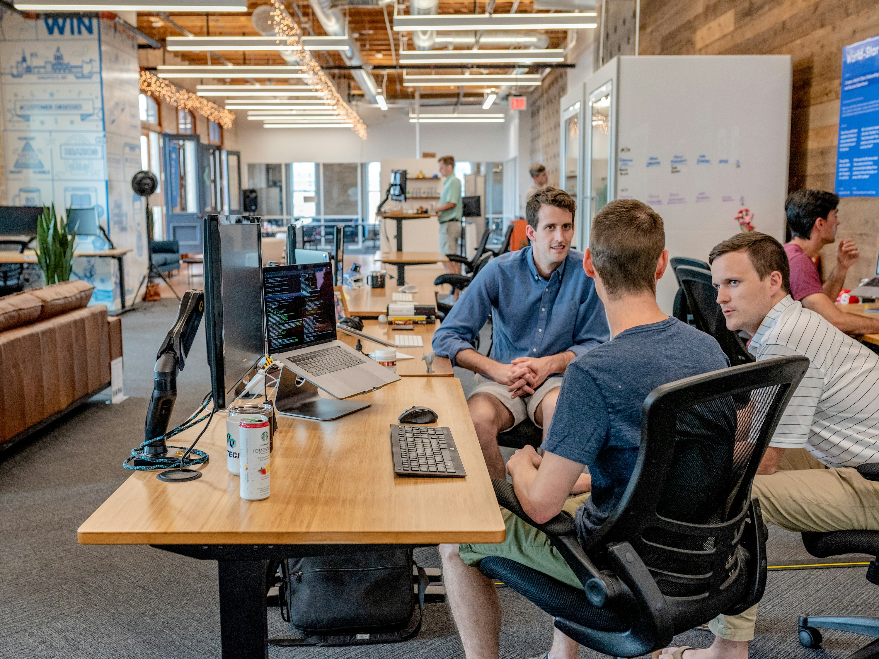 Technology planning meeting in a modern workspace